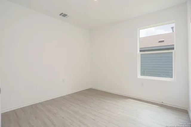 an empty room with a window