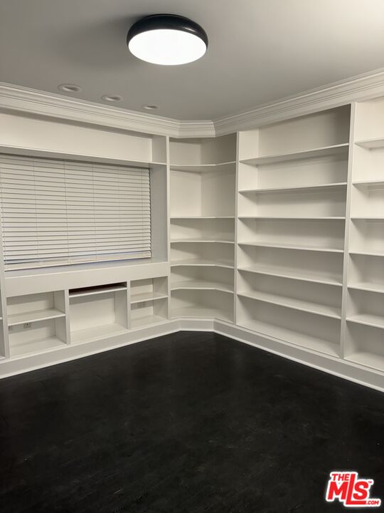 12030 Falcon Crest Way Porter Ranch, CA 91326 - Photo 9 of 33 a view of a room with shelves on the wall