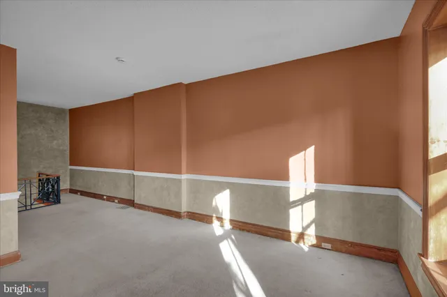 a bathroom with a sink a toilet and shower curtain