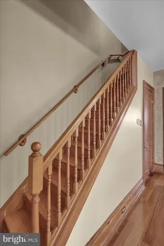 a kitchen with granite countertop cabinets and stainless steel appliances