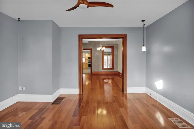 a utility room with a wooden floor
