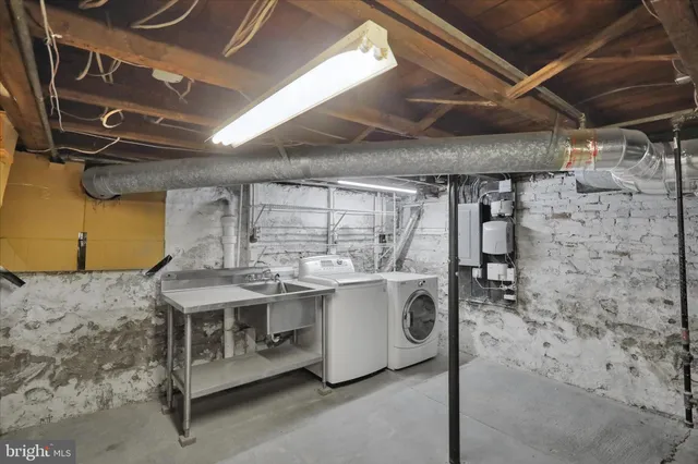 a view of a house with a snow in the backyard
