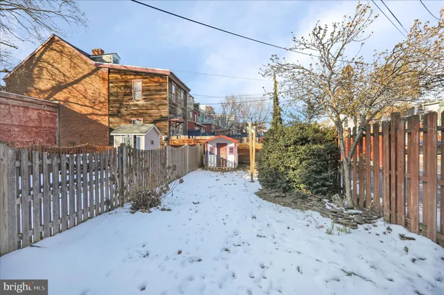 a street view with tall buildings