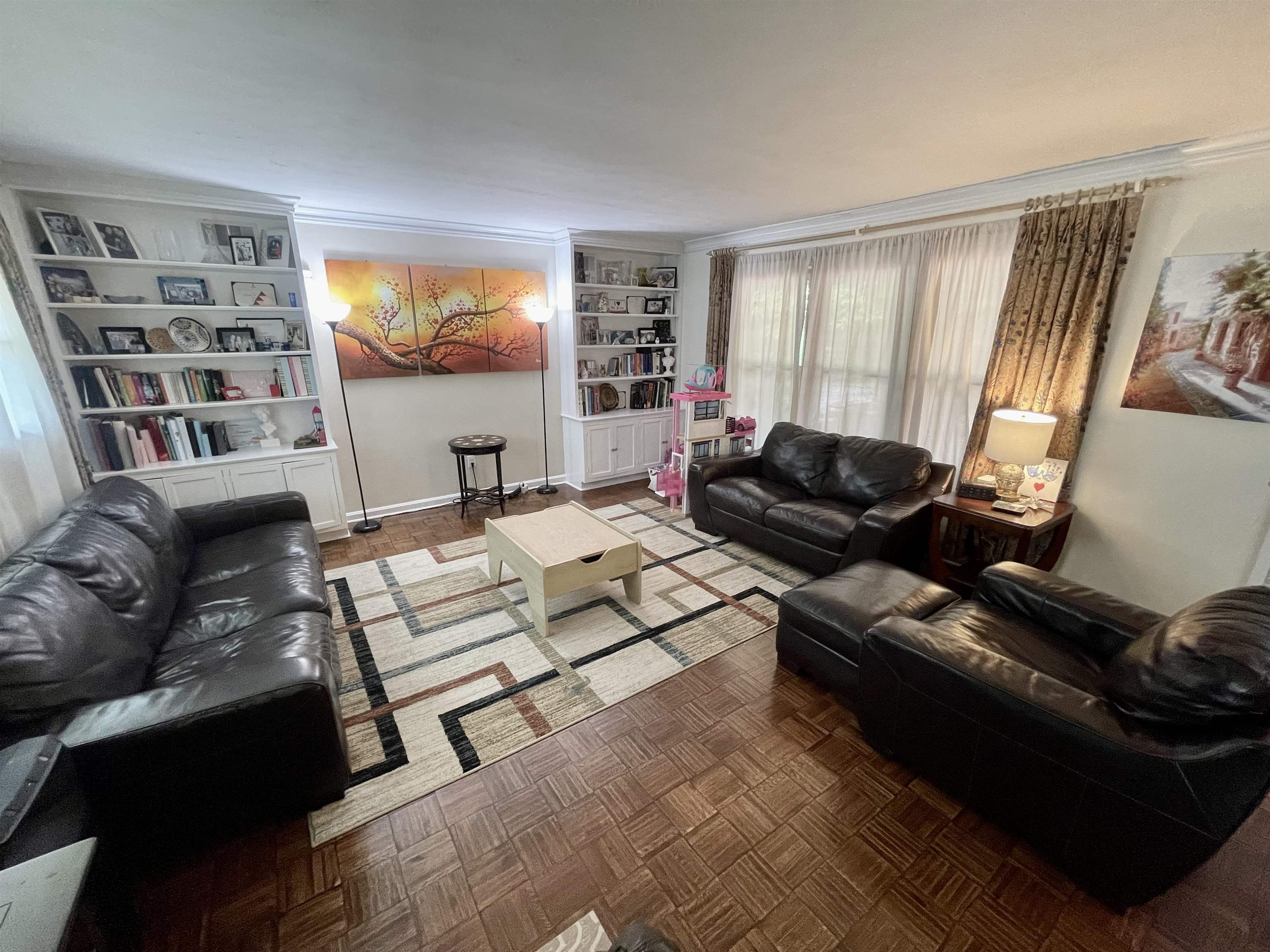 5200 Walnut Grove Road Memphis, TN 38117 - Photo 5 of 24 a living room with furniture and a flat screen tv
