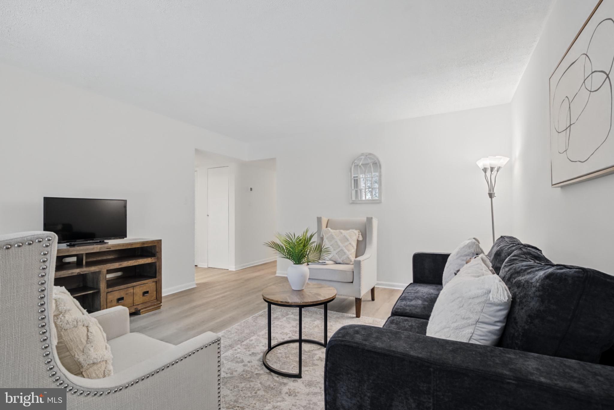 1412 Northgate Square, Unit 1B Reston, VA 20190 - Photo 17 of 45 Picture family movie nights in this beautiful room