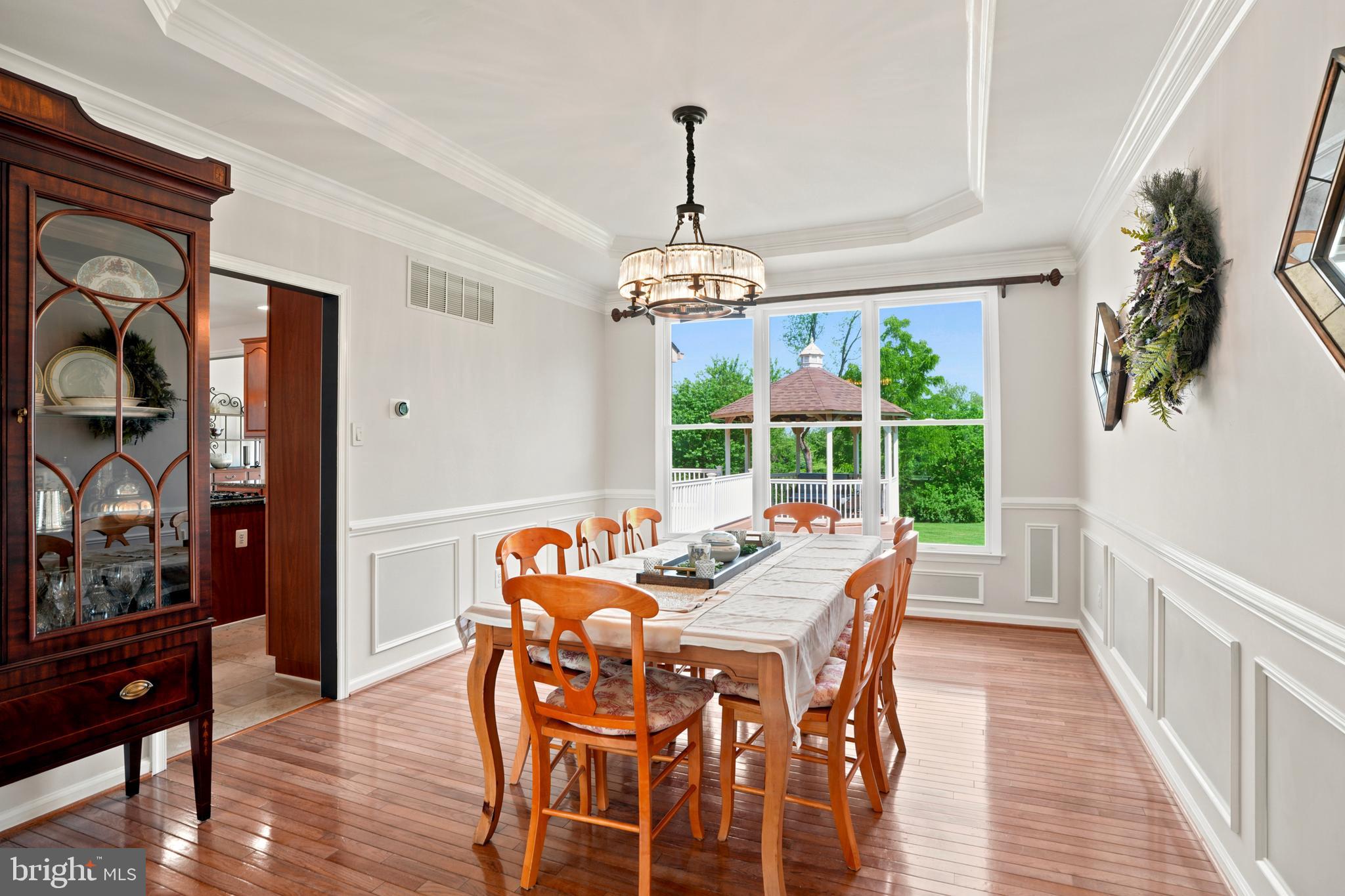2303 Redtail Road Norristown, PA 19403 - Photo 12 of 53 a dining room with furniture a chandelier and wooden floor