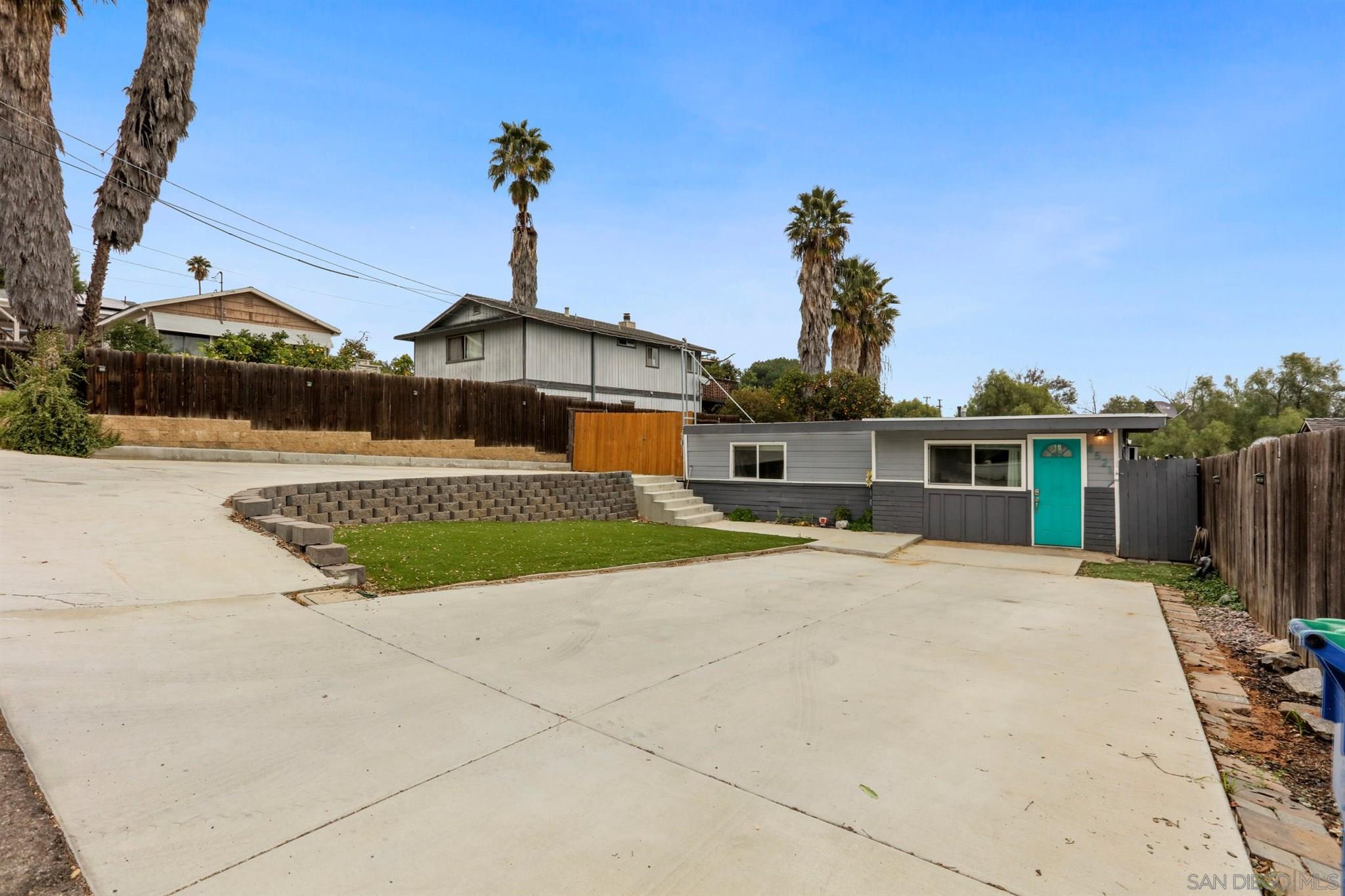 8521 Gaena Road Lakeside, CA 92040 - Photo 1 of 27 a front view of a house with a yard