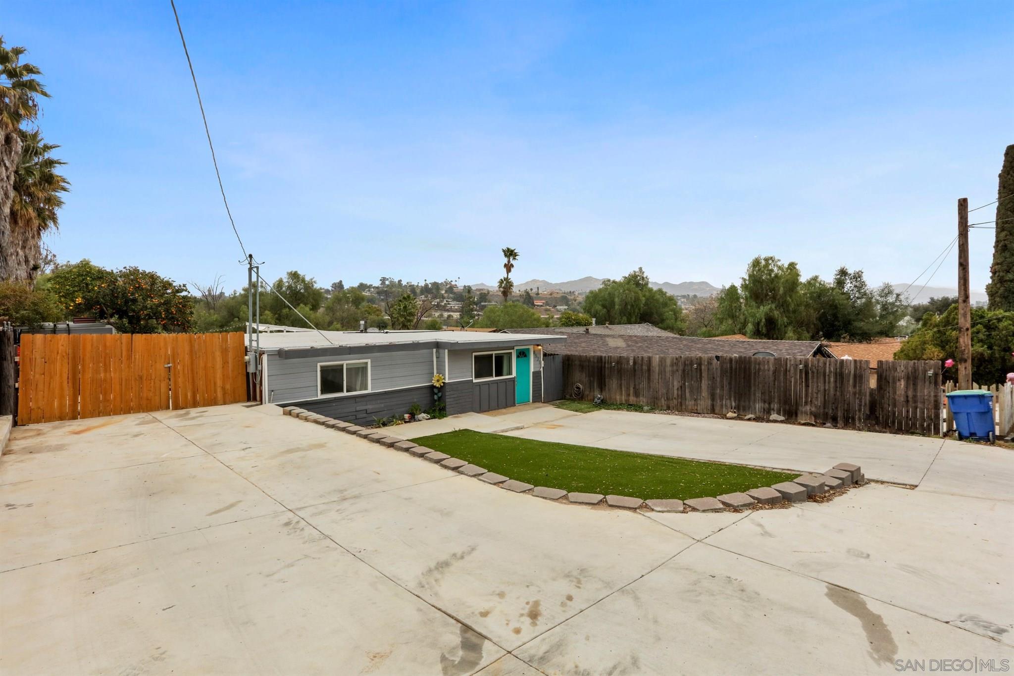 8521 Gaena Road Lakeside, CA 92040 - Photo 2 of 27 a view of a house with pool