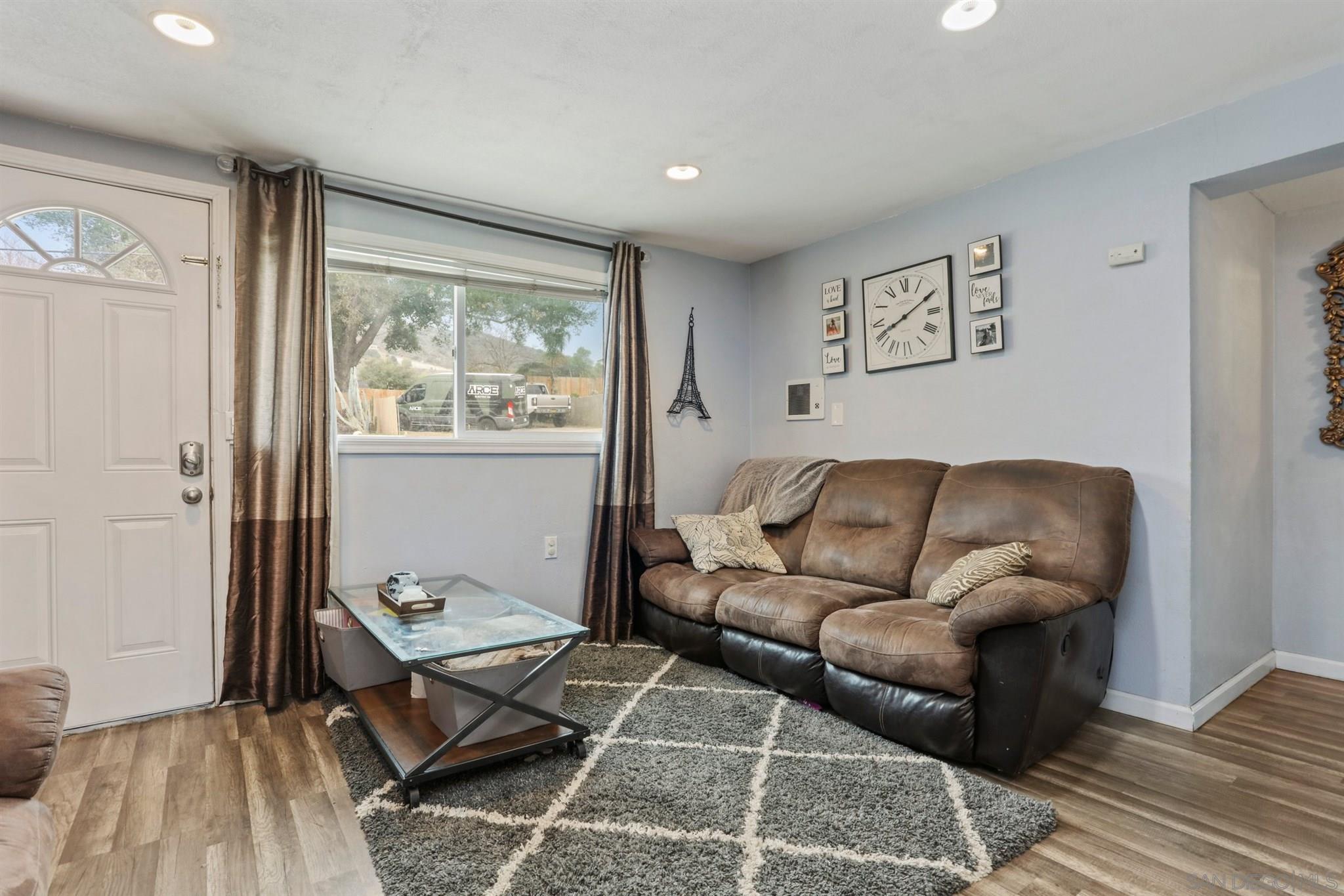 8521 Gaena Road Lakeside, CA 92040 - Photo 11 of 27 a living room with furniture and a window