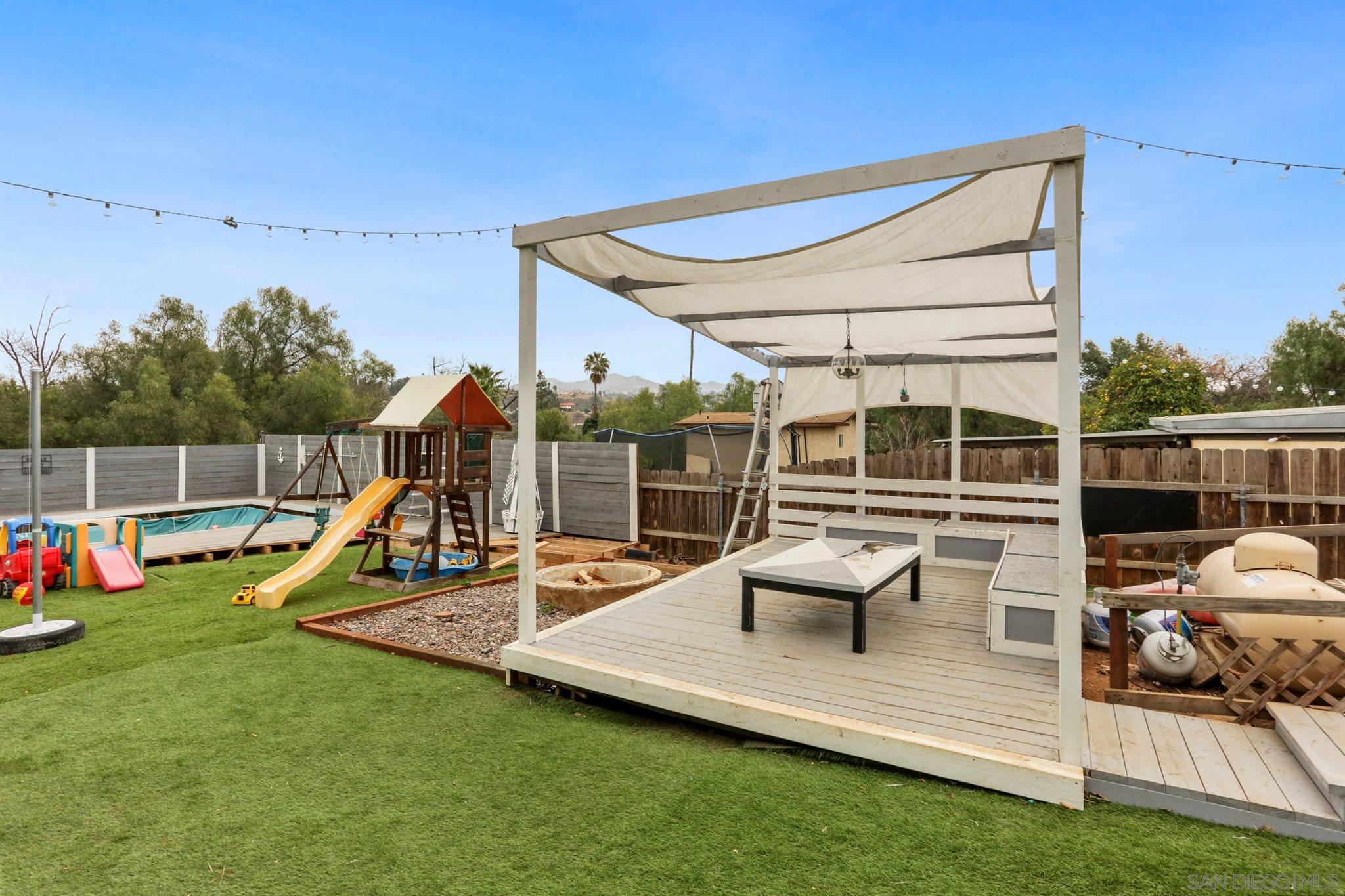 8521 Gaena Road Lakeside, CA 92040 - Photo 20 of 27 a view of a patio with swimming pool