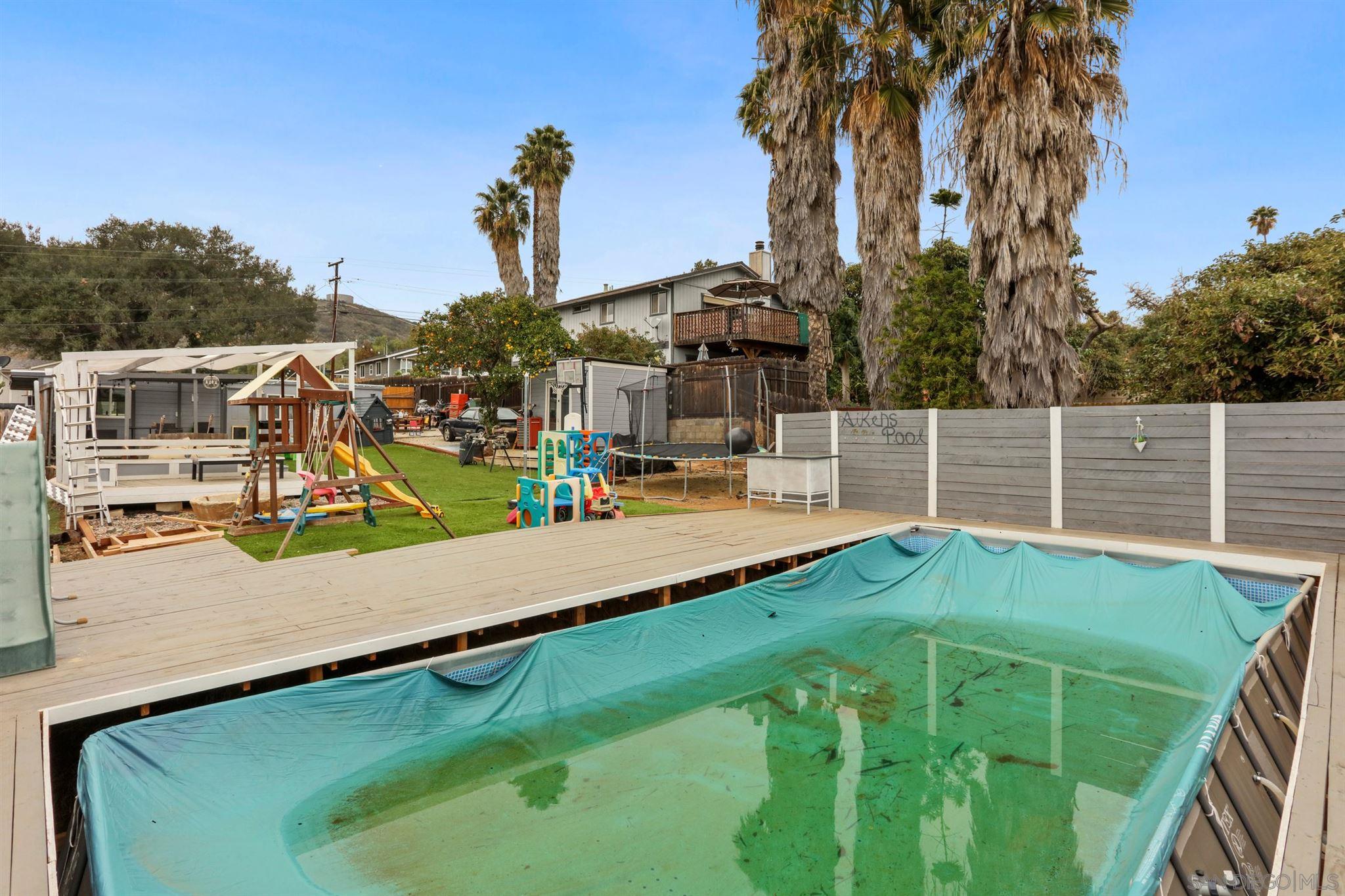 8521 Gaena Road Lakeside, CA 92040 - Photo 25 of 27 swimming pool view with a garden space