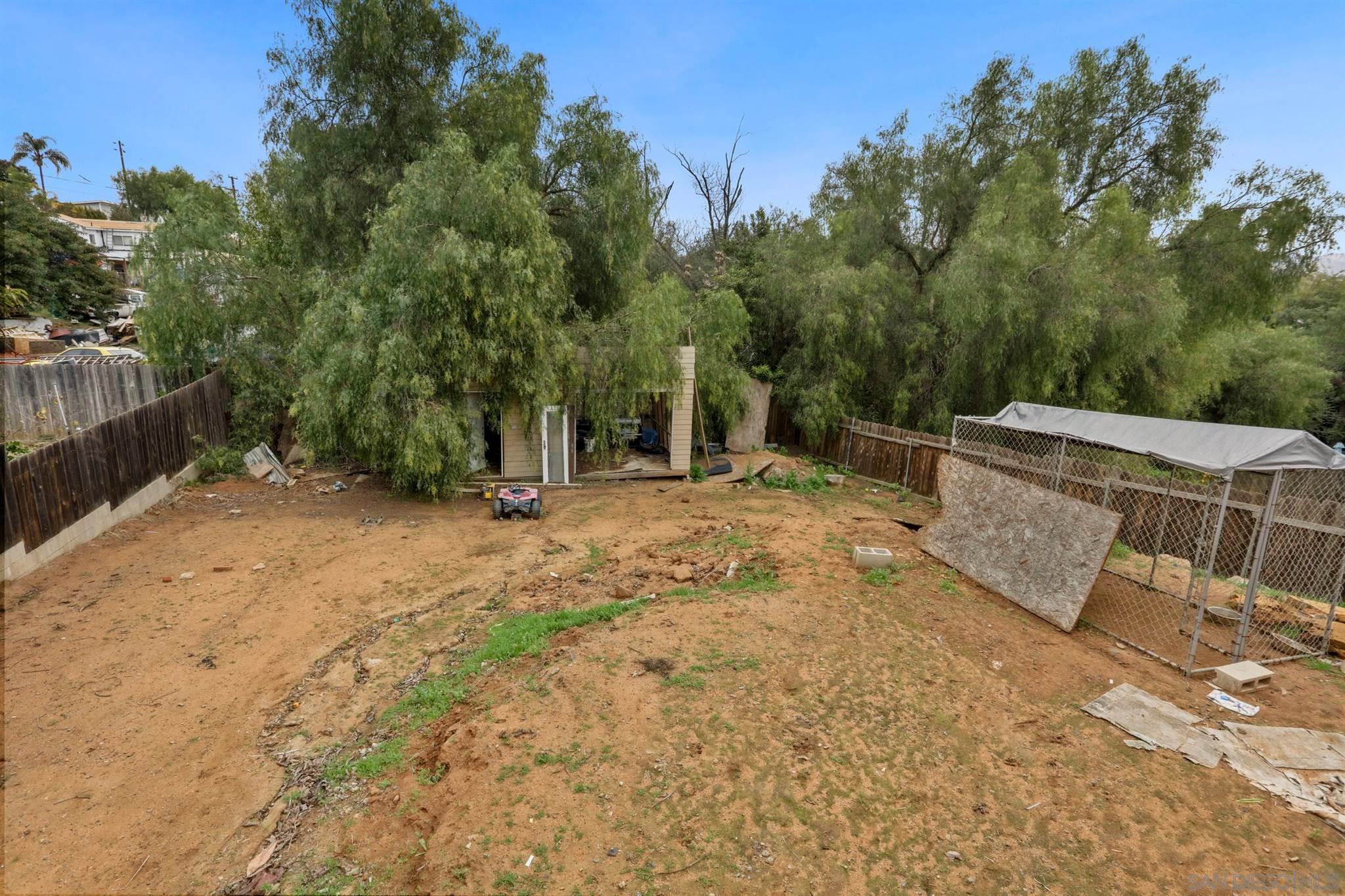 8521 Gaena Road Lakeside, CA 92040 - Photo 26 of 27 a view of a backyard with trees