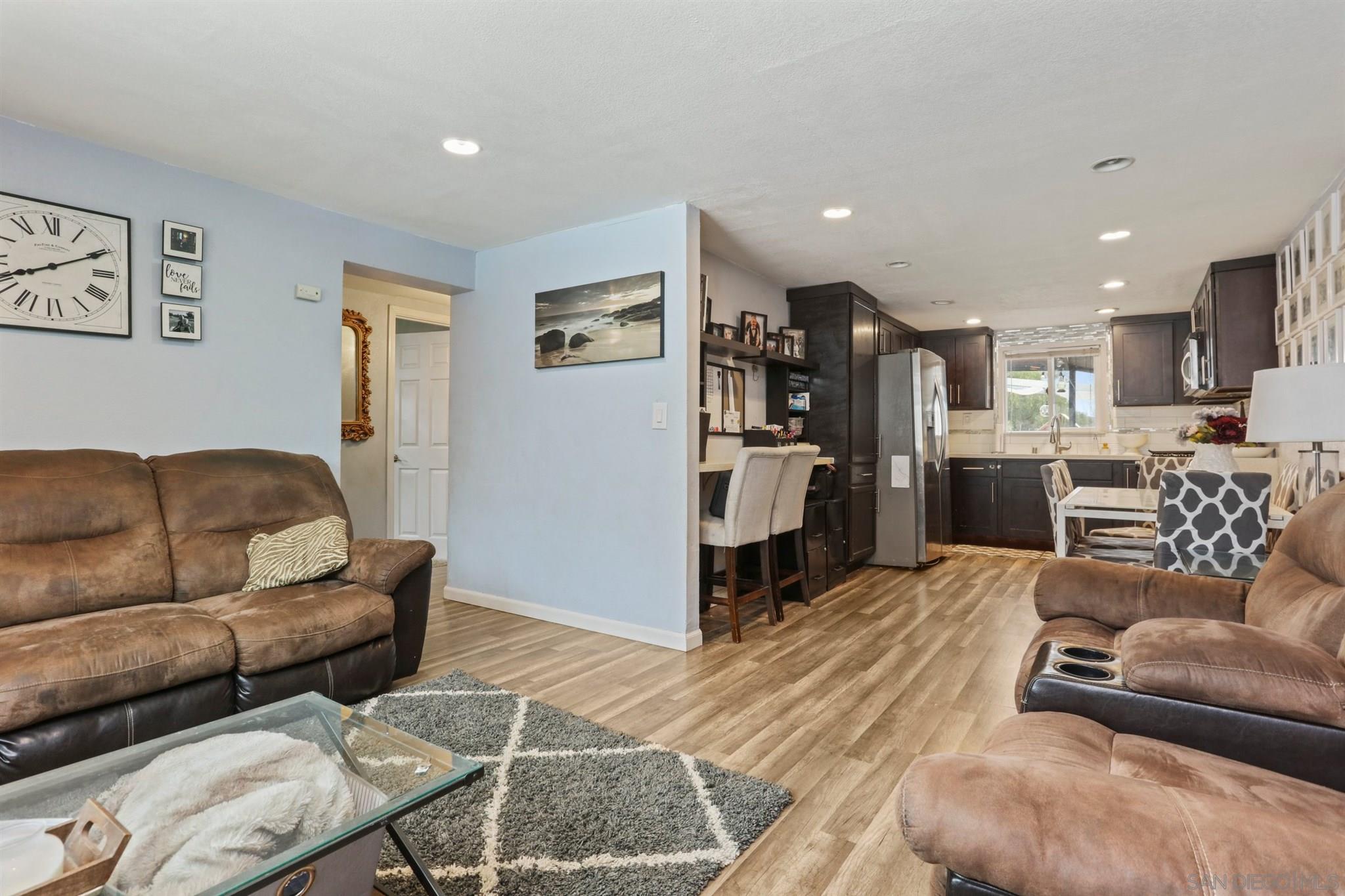 8521 Gaena Road Lakeside, CA 92040 - Photo 5 of 27 a living room with furniture and kitchen view