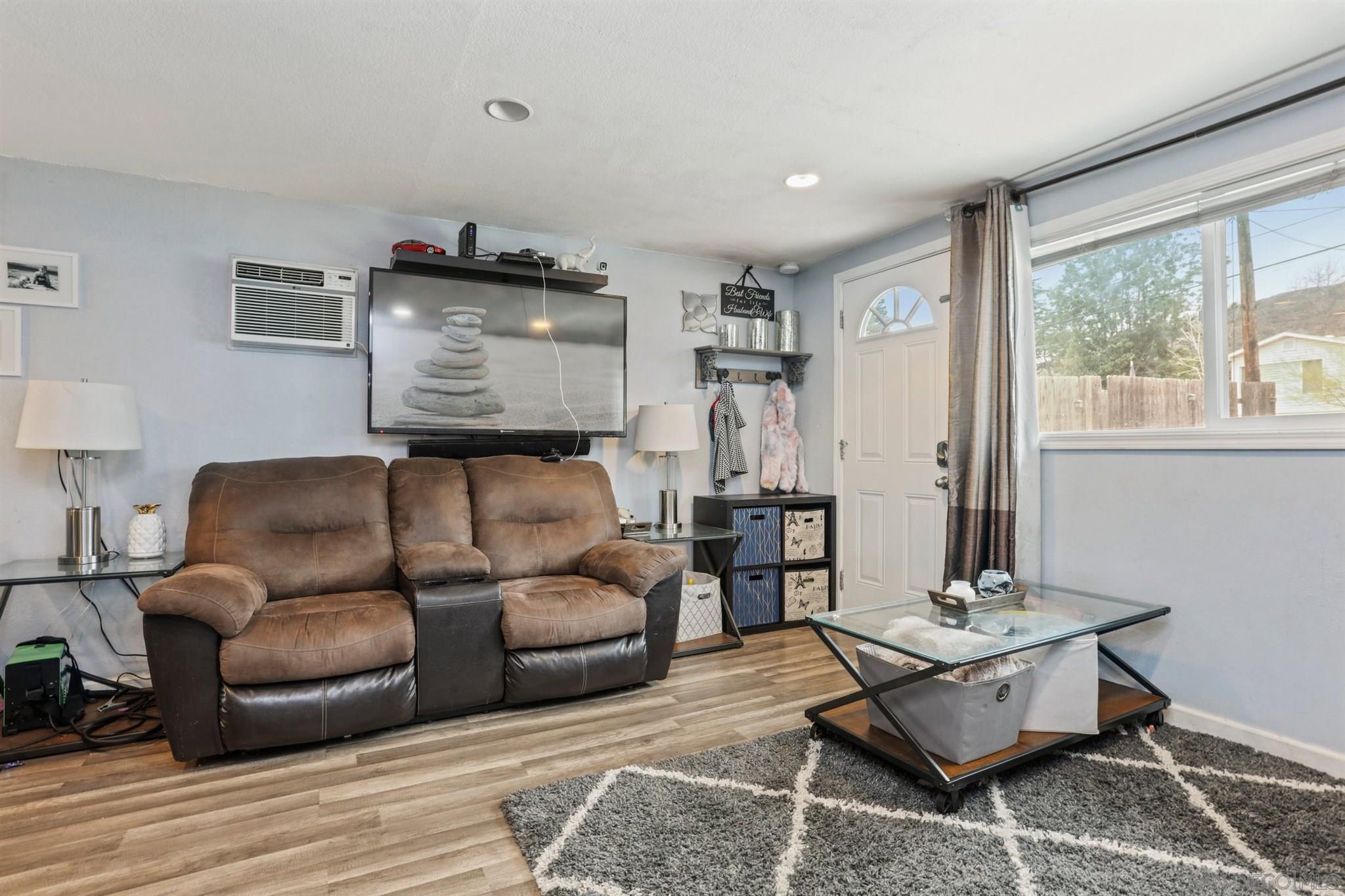 8521 Gaena Road Lakeside, CA 92040 - Photo 10 of 27 a living room with furniture and a window