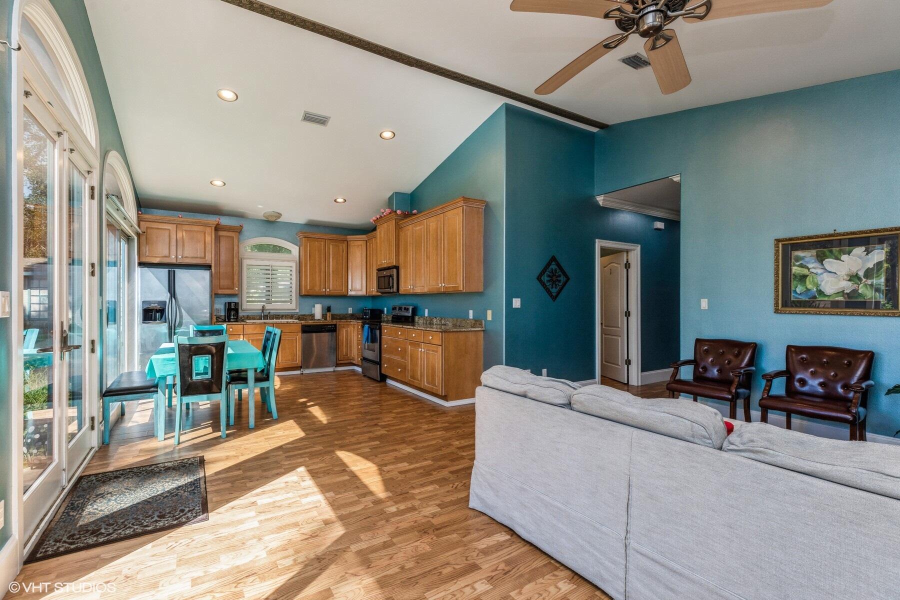 13000 Highway 20 Freeport, FL 32439 - Photo 8 of 31 a living room with furniture and a wooden floor