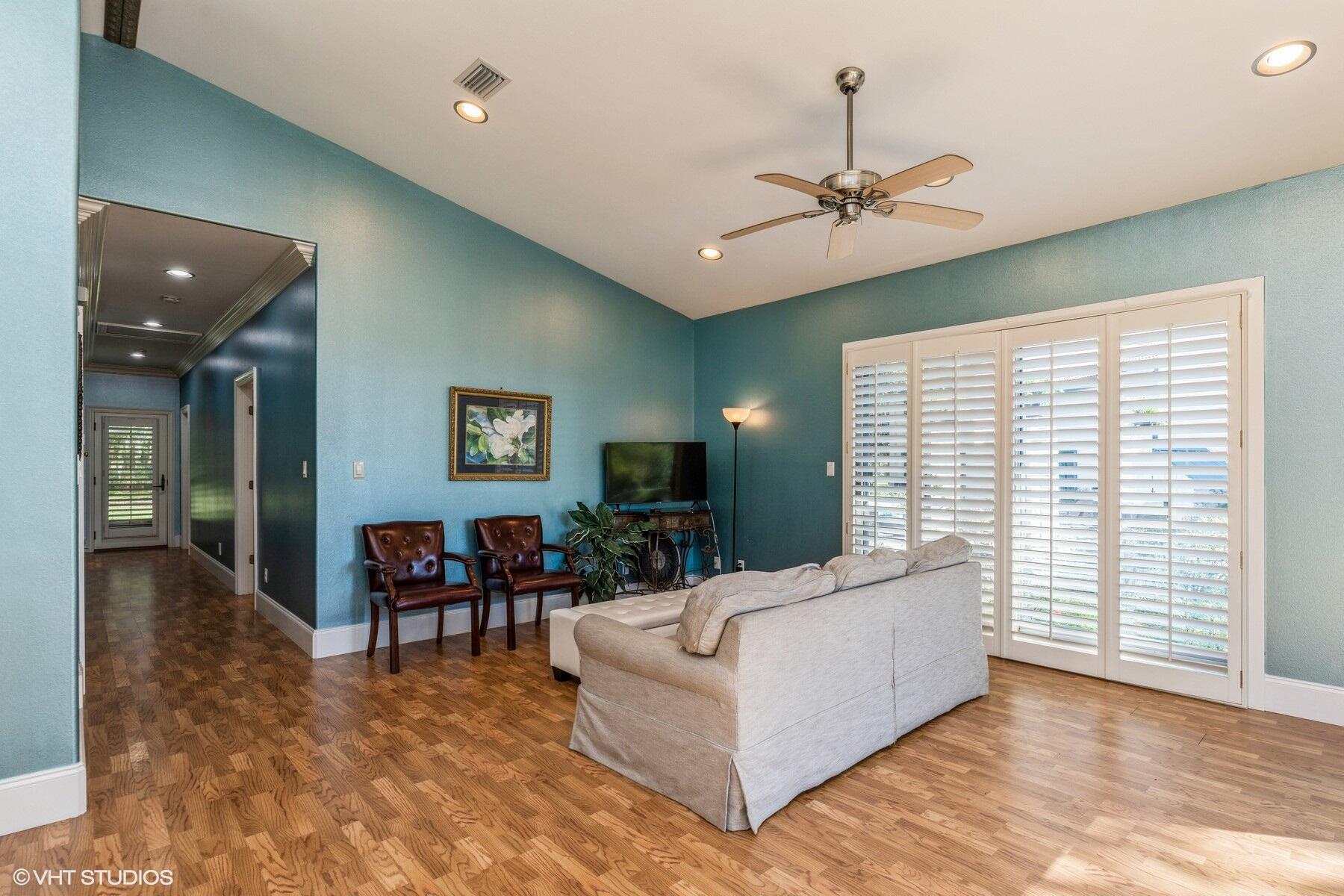 13000 Highway 20 Freeport, FL 32439 - Photo 9 of 31 a living room with furniture and a flat screen tv