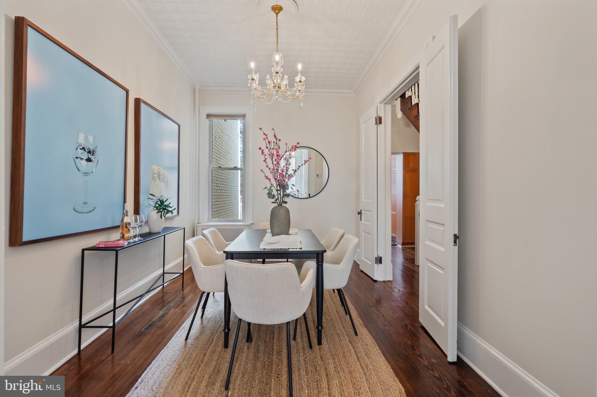 705 7th Street Northeast Washington, DC 20002 - Photo 11 of 48 a view of a dining room with furniture window and wooden floor