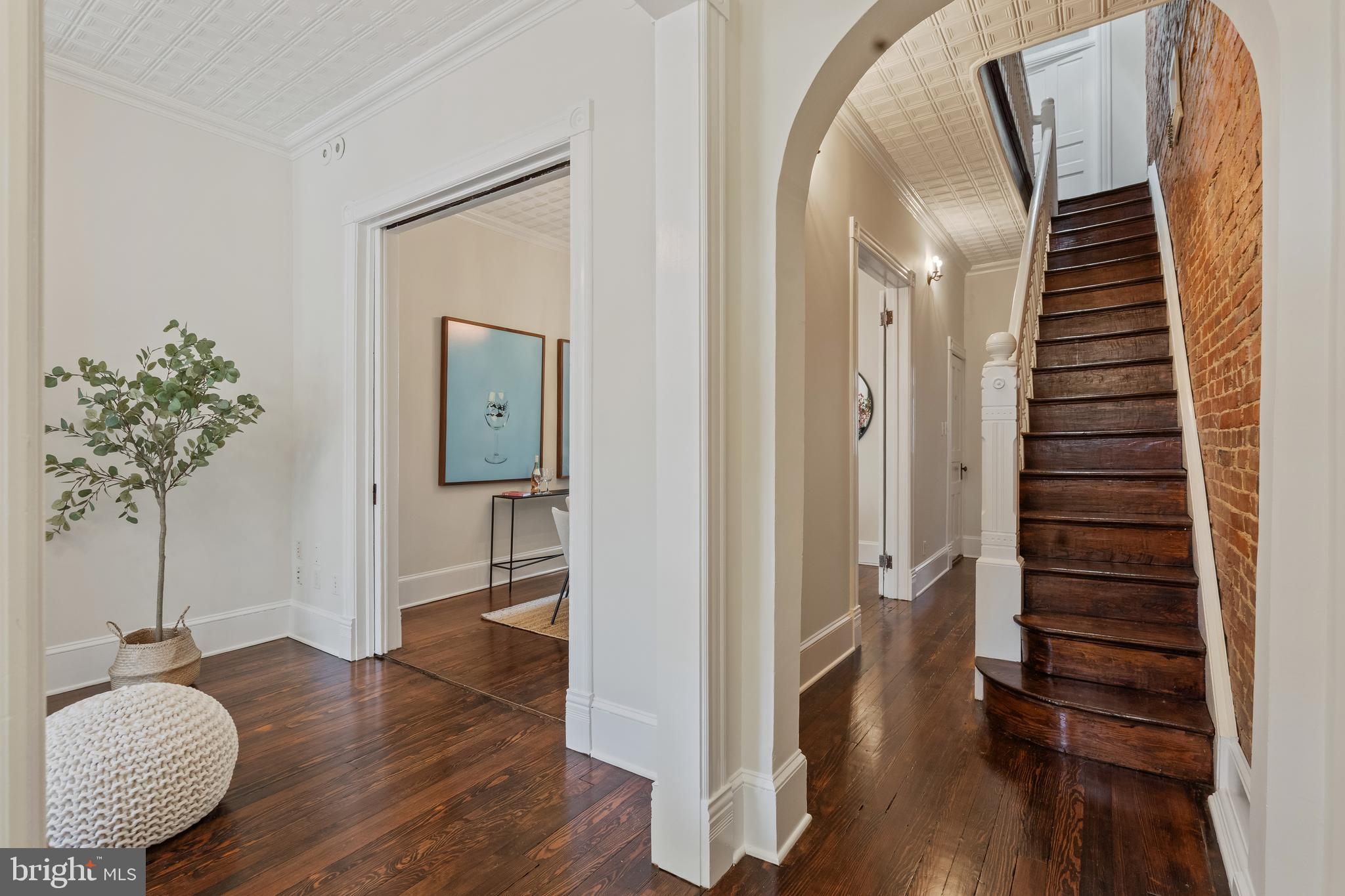 705 7th Street Northeast Washington, DC 20002 - Photo 16 of 48 a view of hallway with livingroom and wooden floor