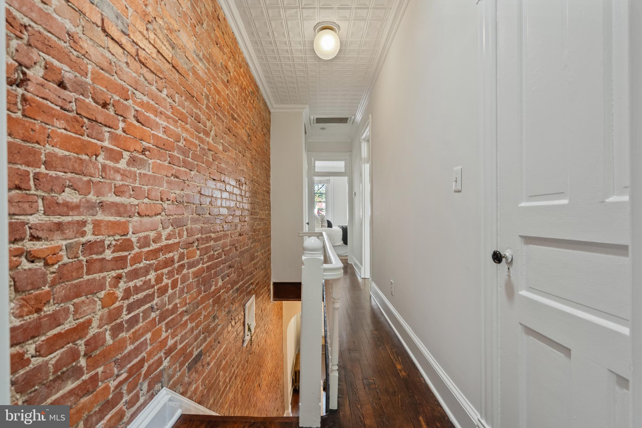 705 7th Street Northeast Washington, DC 20002 - Photo 19 of 48 a bathroom with a mirror and a shower