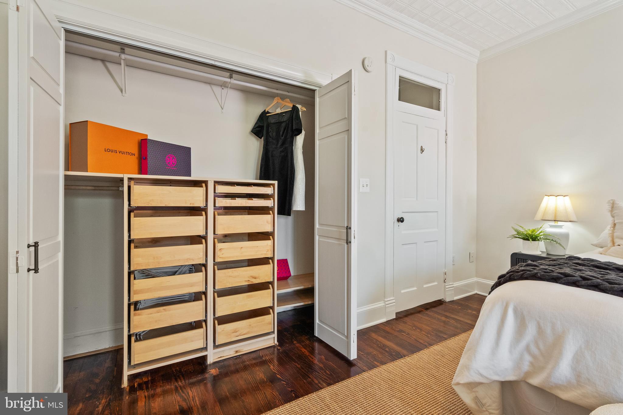 705 7th Street Northeast Washington, DC 20002 - Photo 25 of 48 a bedroom with a bed and wooden floor