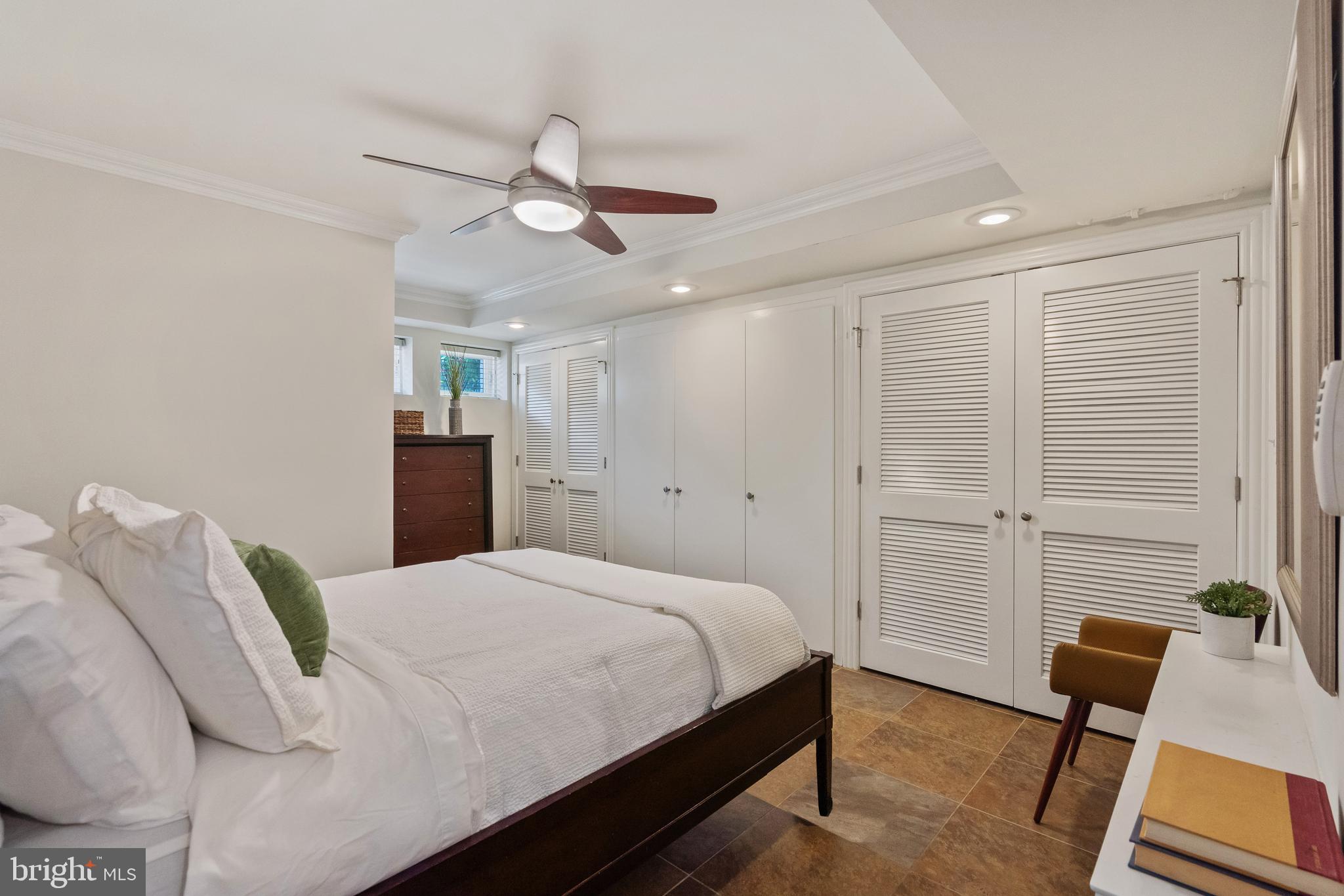 705 7th Street Northeast Washington, DC 20002 - Photo 35 of 48 a bedroom with a bed and a furniture