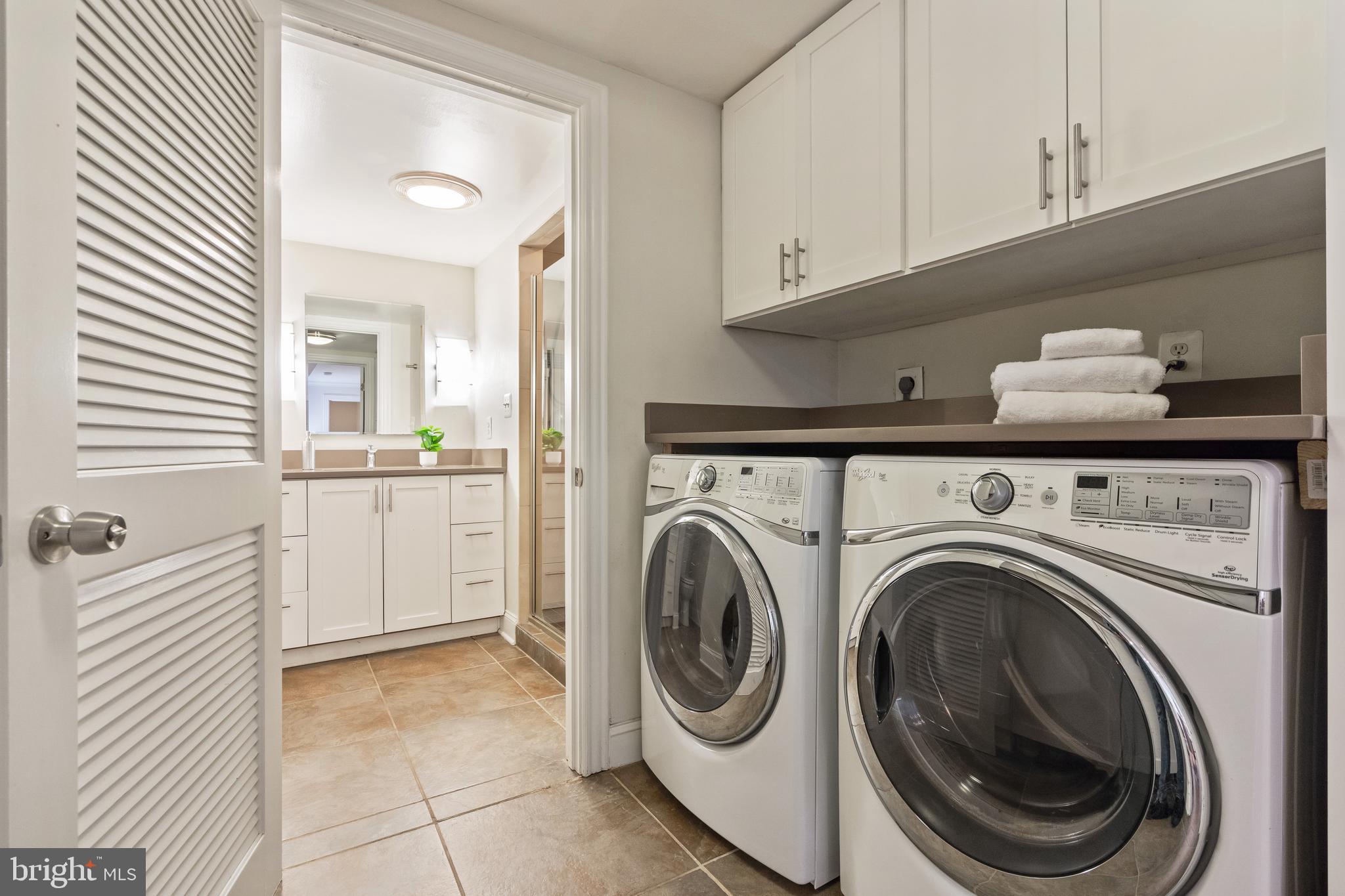 705 7th Street Northeast Washington, DC 20002 - Photo 39 of 48 a view of a hallway with washer and dryer
