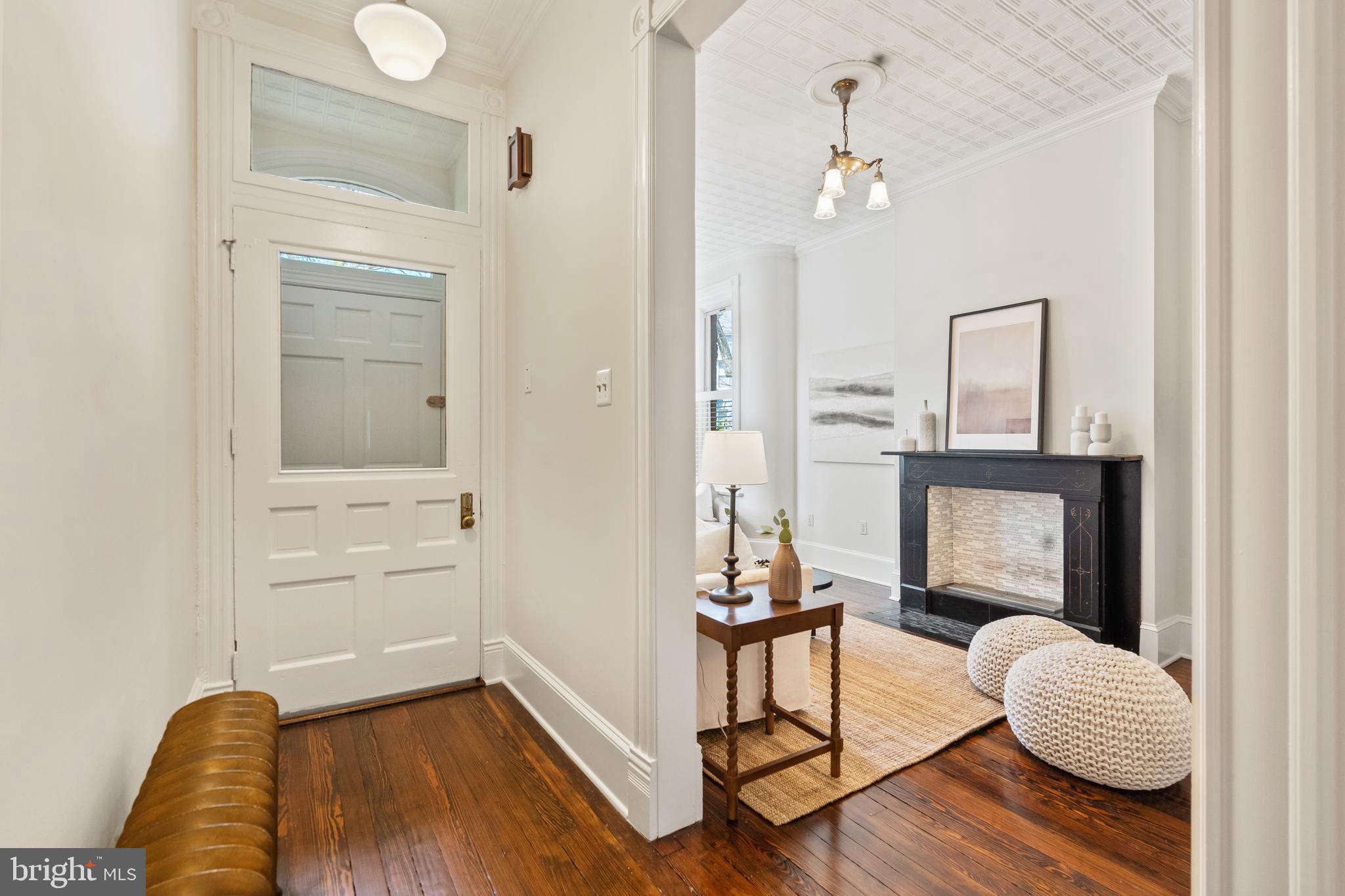 705 7th Street Northeast Washington, DC 20002 - Photo 4 of 48 a living room with furniture and wooden floor