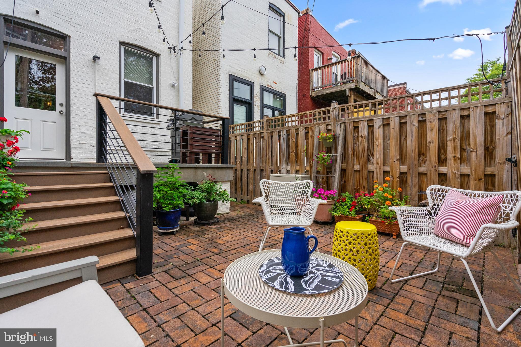 705 7th Street Northeast Washington, DC 20002 - Photo 43 of 48 a view of a dinning tables and chairs in the patio