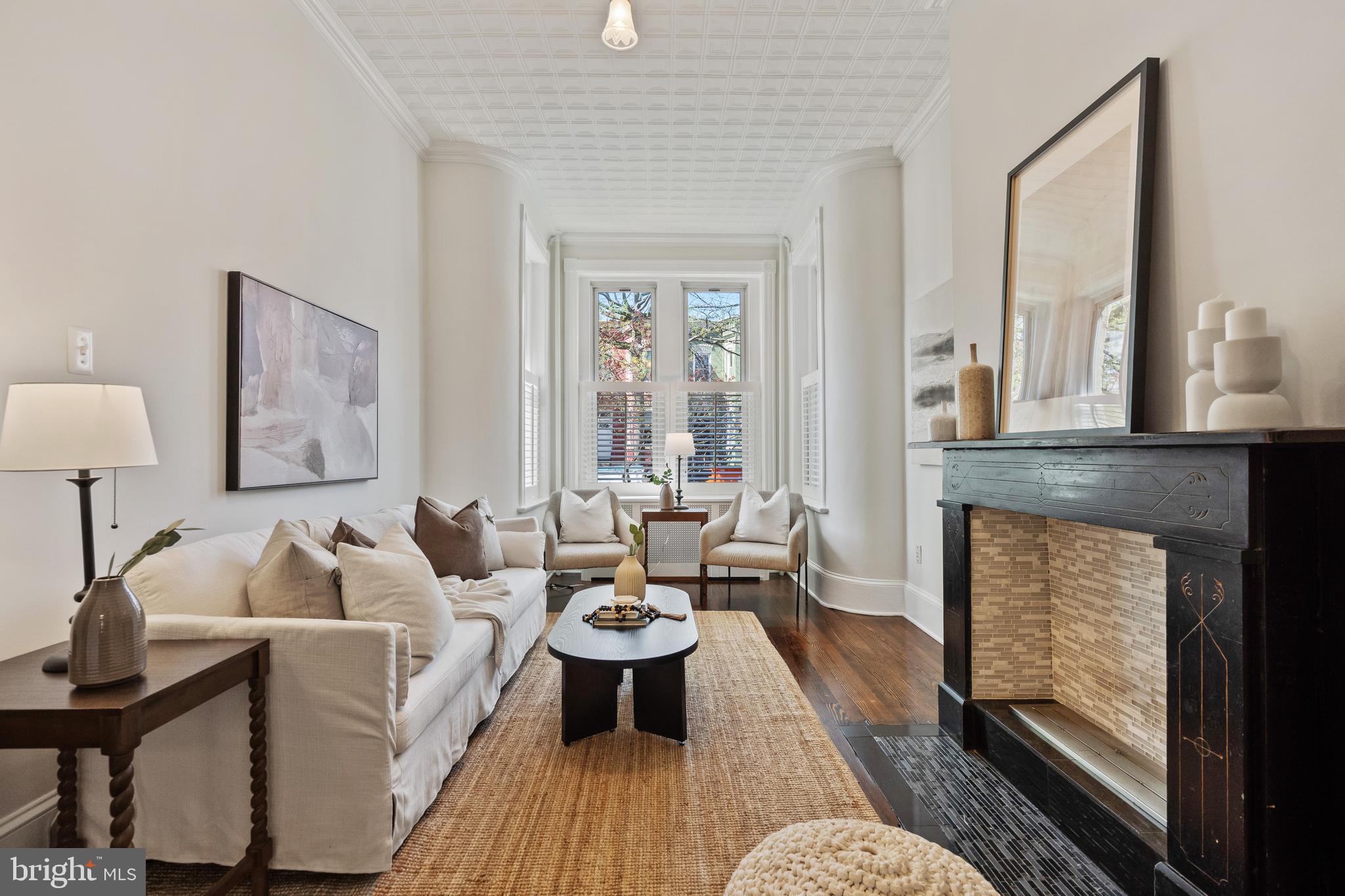 705 7th Street Northeast Washington, DC 20002 - Photo 6 of 48 a living room with furniture and a window