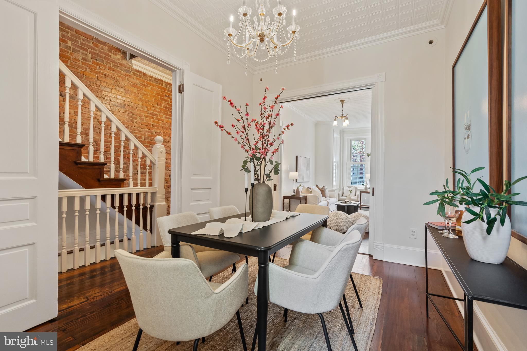 705 7th Street Northeast Washington, DC 20002 - Photo 10 of 48 a view of a dining room with furniture window and wooden floor