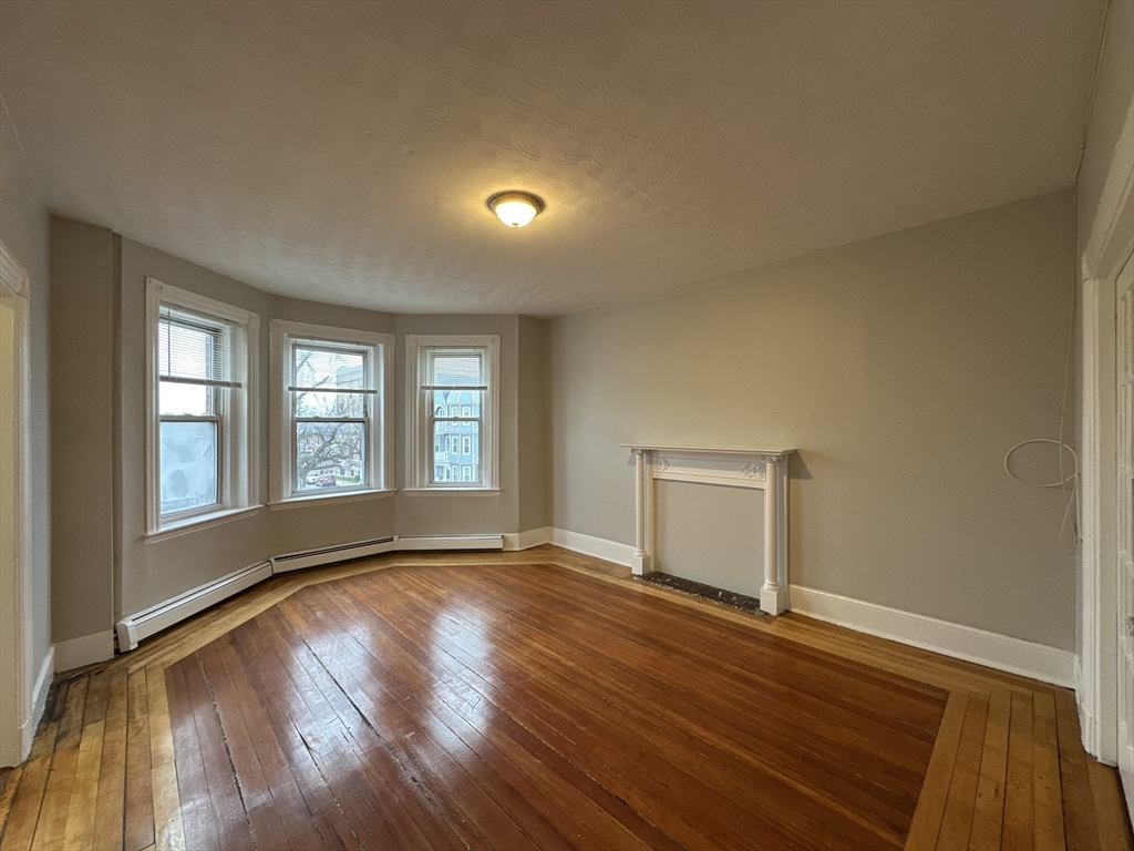 39 Forest Street, Unit 2 Boston, MA 02119 - Photo 1 of 18