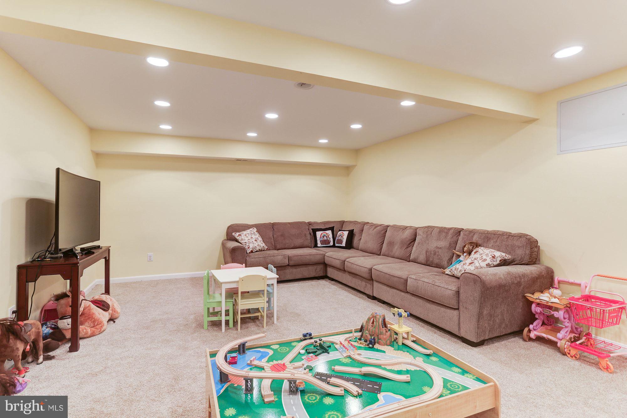 16204 Whitehaven Road Silver Spring, MD 20906 - Photo 25 of 35 Lower level Family Room