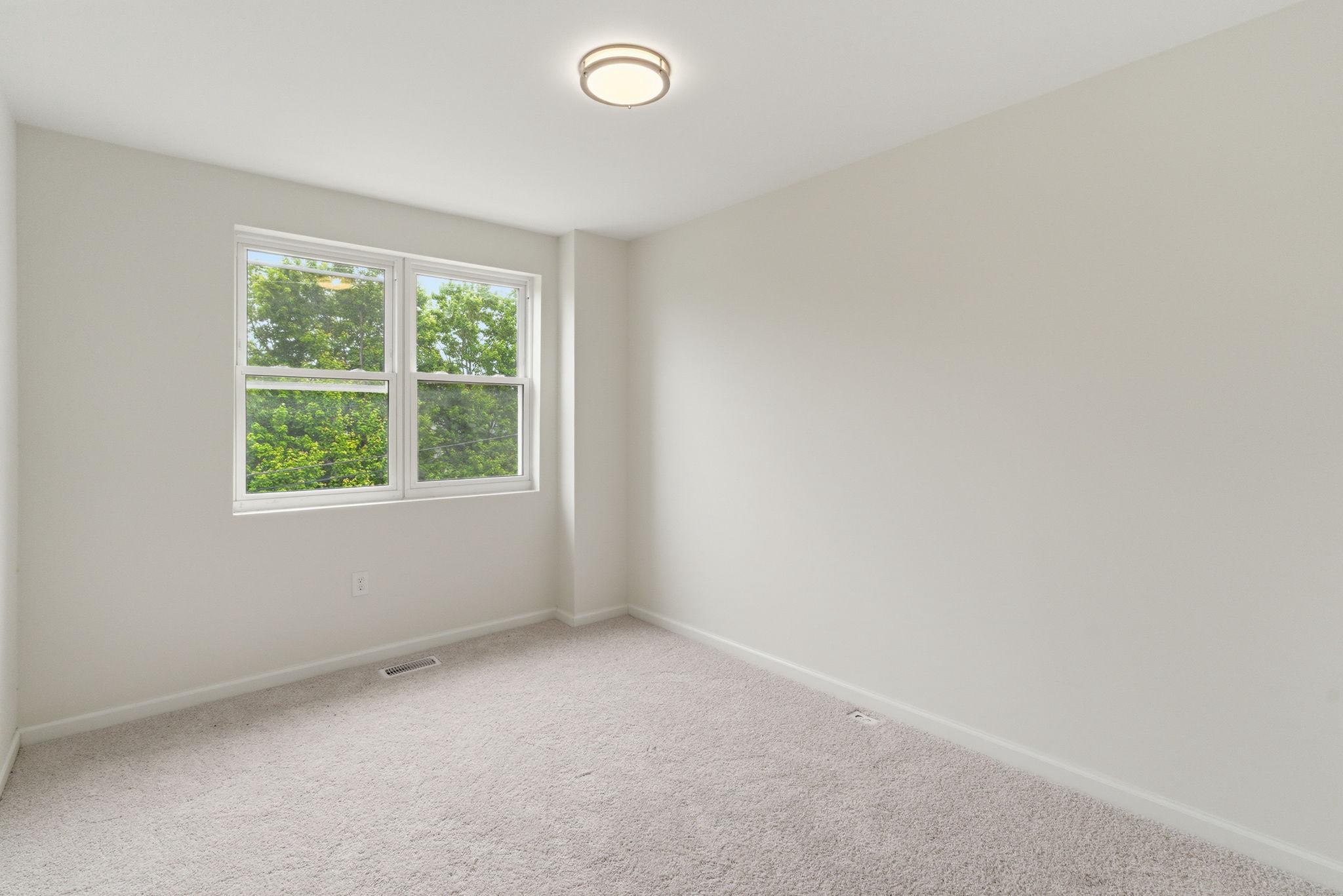 4111 Roland View Avenue Baltimore, MD 21215 - Photo 11 of 19 Bright and airy bedroom