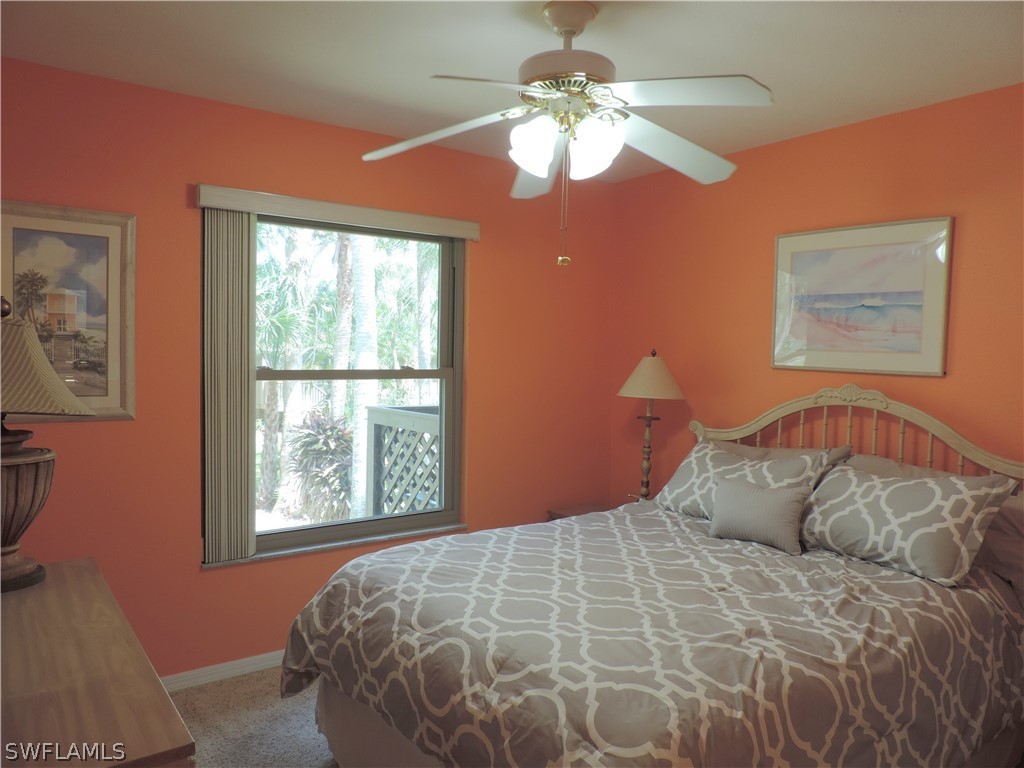 17624 Village Inlet Court Fort Myers, FL 33908 - Photo 14 of 17 a bedroom with a large bed and a window