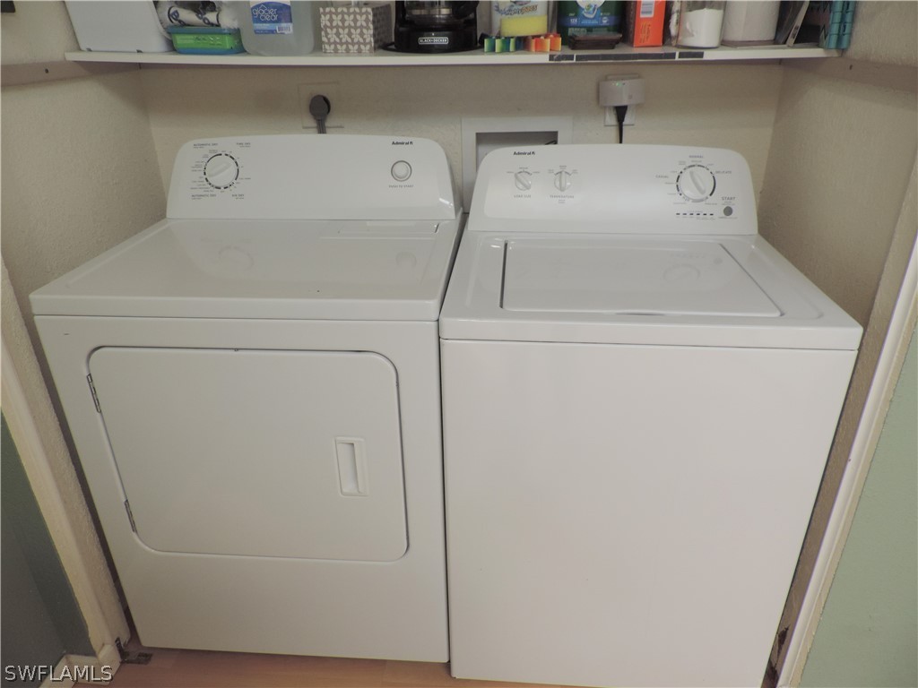 17624 Village Inlet Court Fort Myers, FL 33908 - Photo 16 of 17 a utility room with dryer and washer