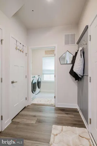 a view of a hallway to a room