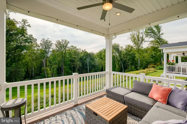 a view of a two chairs in the deck