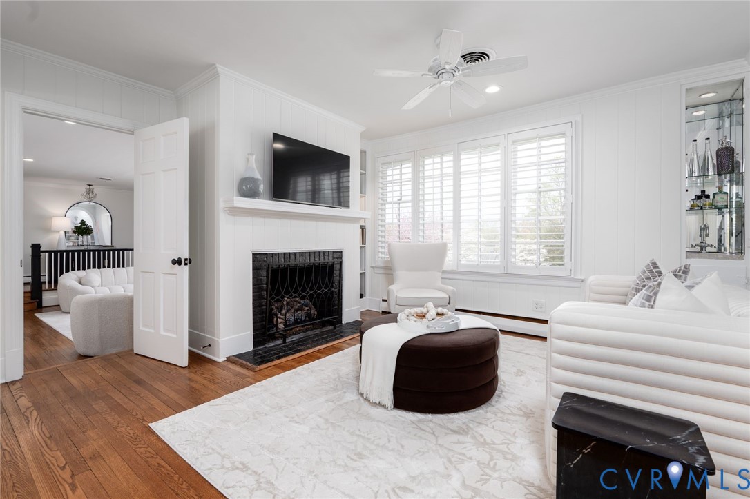 509 Gardiner Road Henrico, VA 23229 - Photo 13 of 42 Light filled living area with fireplace, custom mi