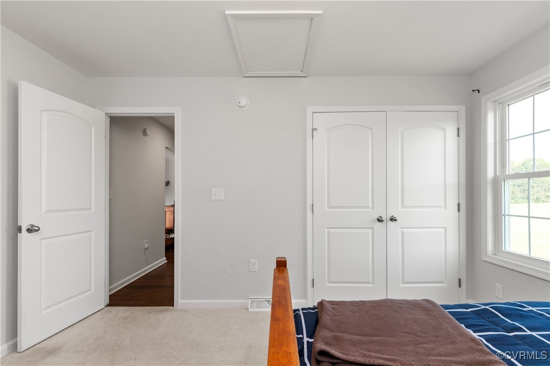 4473 Pin Oak Road Prospect, VA 23960 - Photo 35 of 50 a bedroom with a bed and a window
