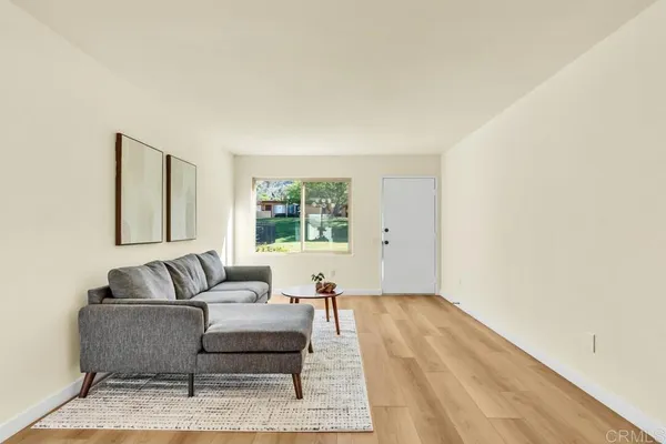 a living room with furniture and a couch