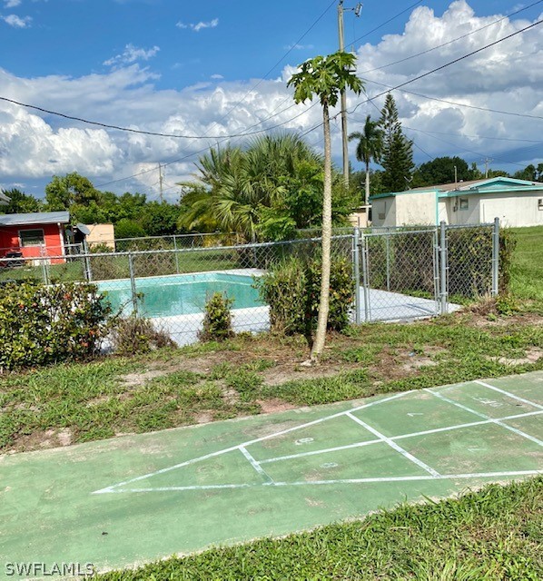 306 Oregon Road West Lehigh Acres, FL 33936 - Photo 19 of 26 a view of a basketball court