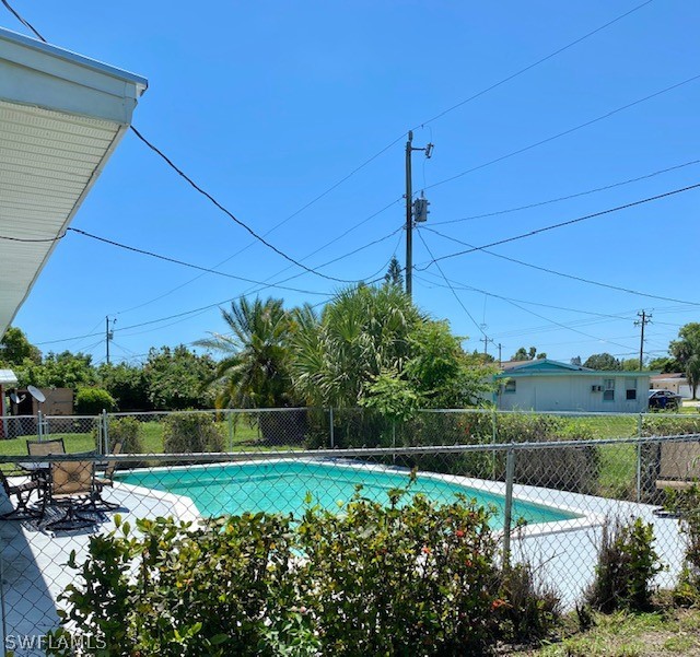 306 Oregon Road West Lehigh Acres, FL 33936 - Photo 25 of 26 a view of a garden with plants