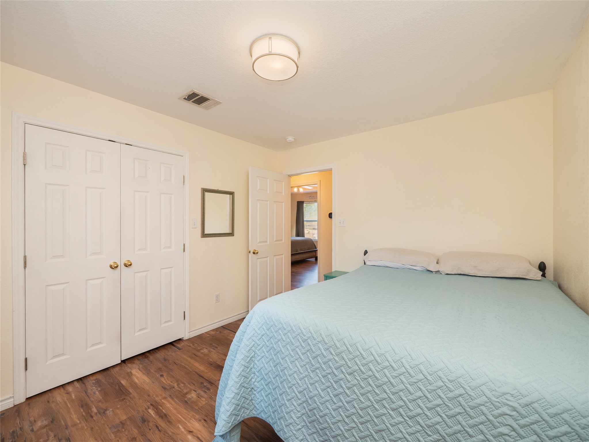228 Old Firetower Road Bastrop, TX 78602 - Photo 20 of 40 a view of a room with wooden floor and natural light