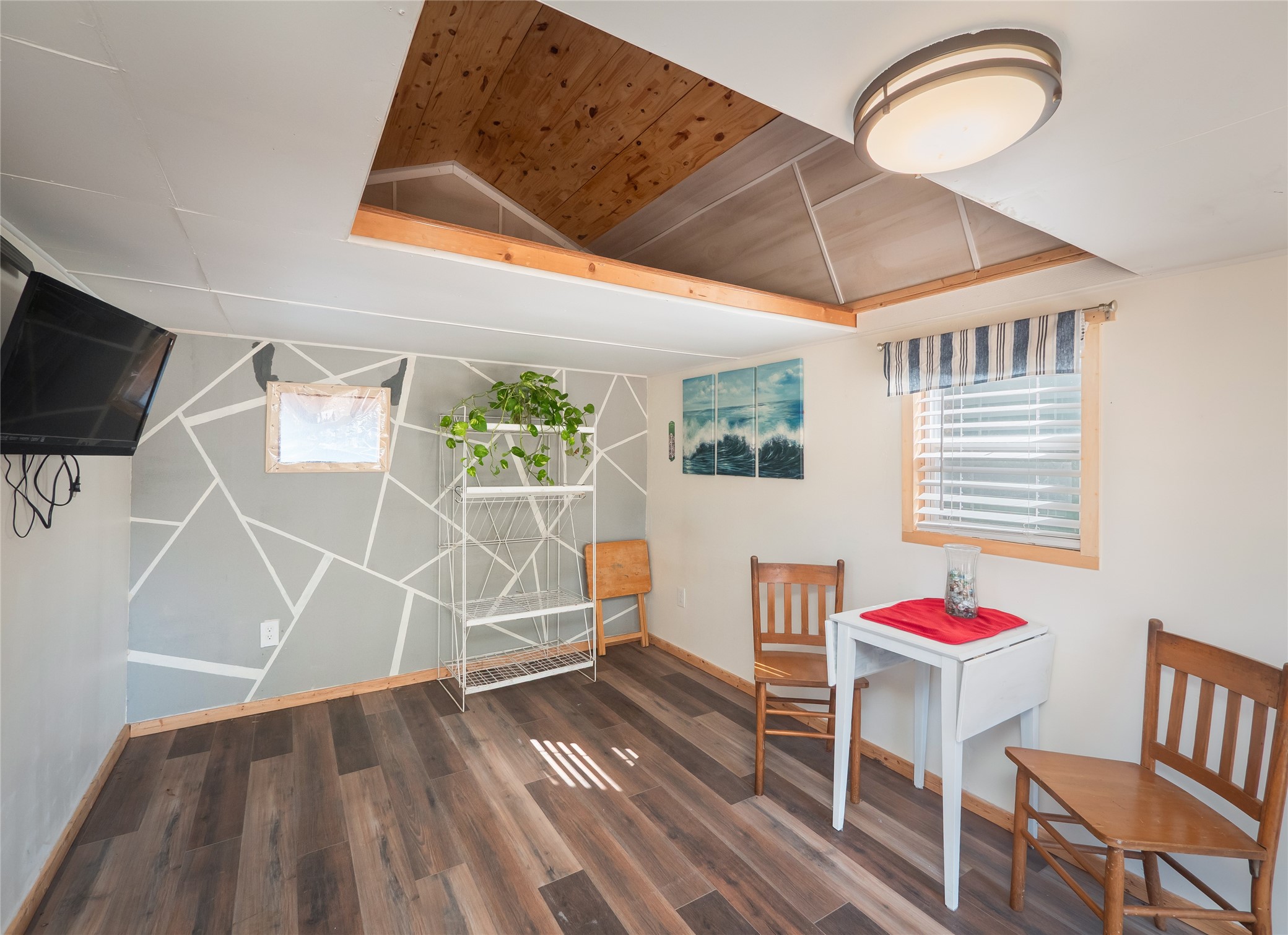 228 Old Firetower Road Bastrop, TX 78602 - Photo 34 of 40 a room with wooden floor and windows