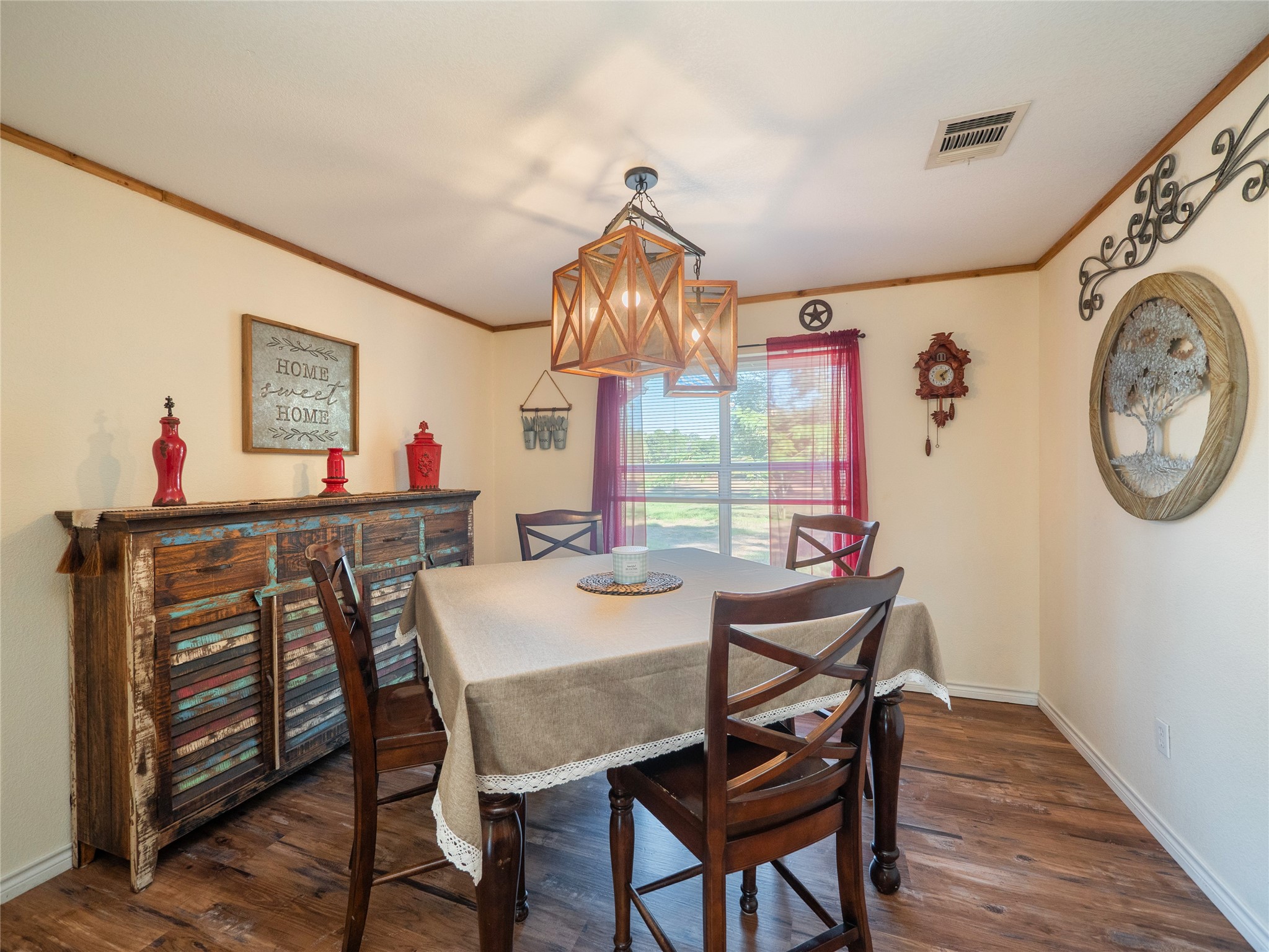 228 Old Firetower Road Bastrop, TX 78602 - Photo 7 of 40 a view of a dining room with furniture window and wooden floor
