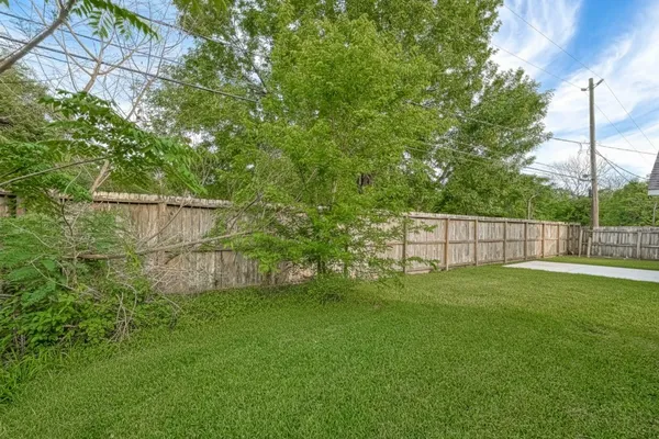 a view of a backyard with a garden