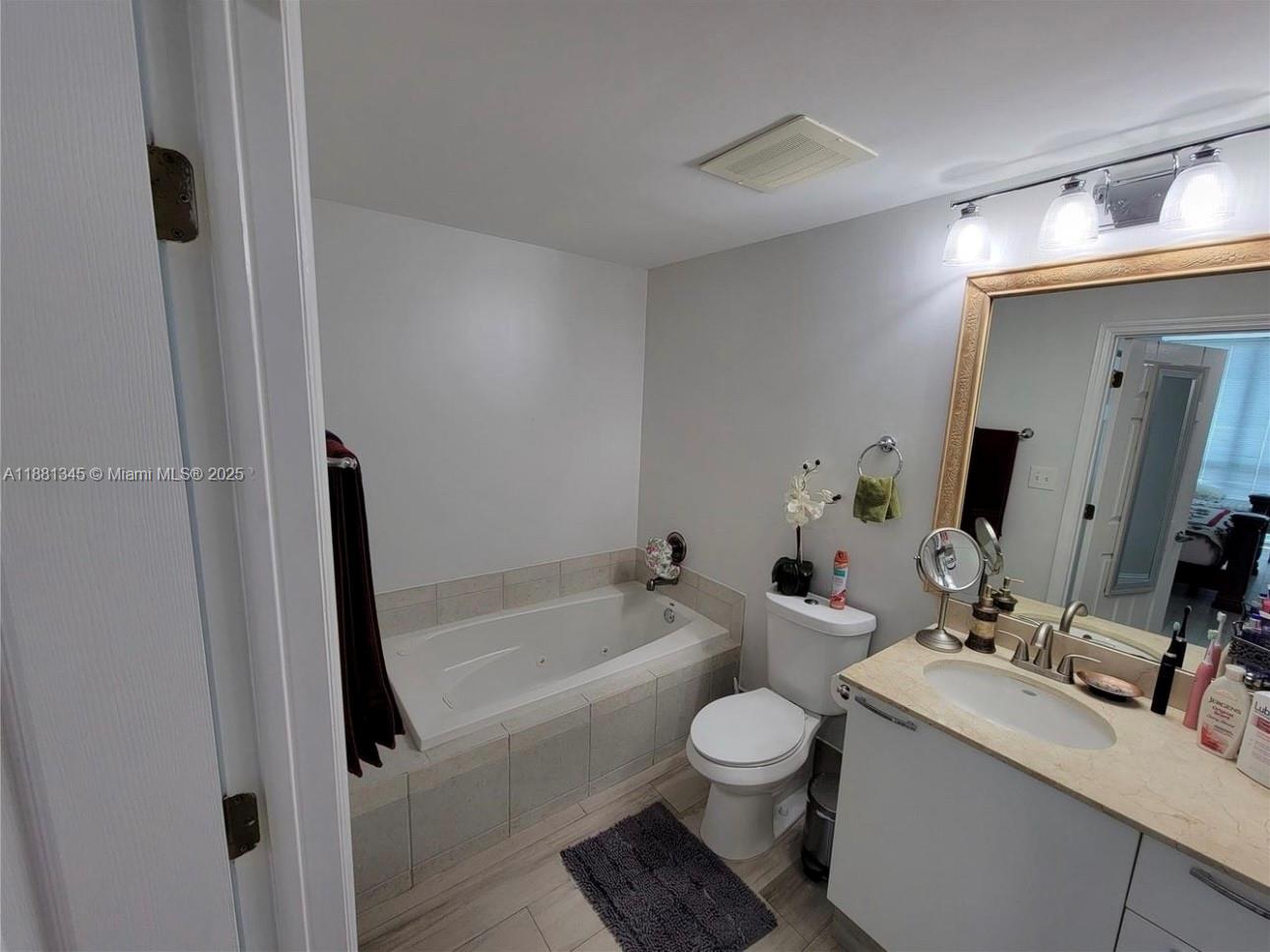 140 South Dixie Highway, Unit 519 Hollywood, FL 33020 - Photo 11 of 28 a bathroom with a sink toilet and shower