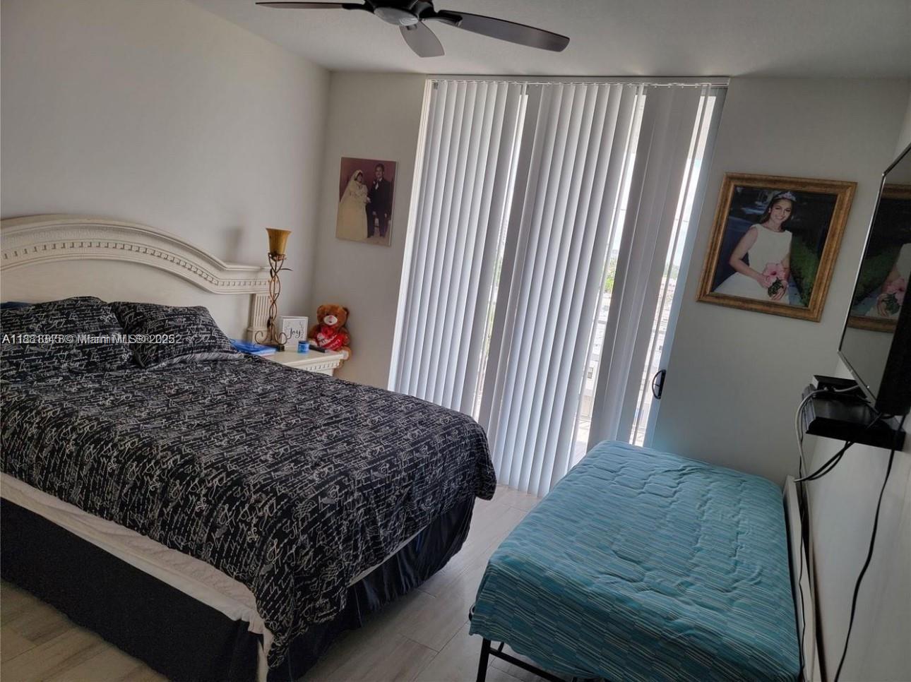 140 South Dixie Highway, Unit 519 Hollywood, FL 33020 - Photo 14 of 28 a bedroom with a bed and a dresser
