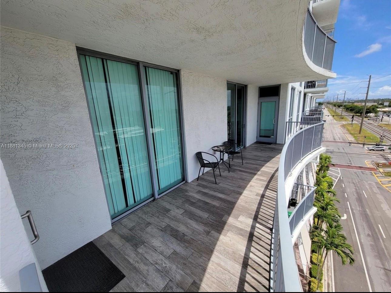 140 South Dixie Highway, Unit 519 Hollywood, FL 33020 - Photo 21 of 28 a swimming pool with furniture