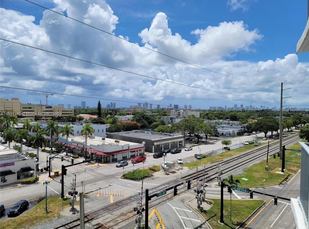 140 South Dixie Highway, Unit 519 Hollywood, FL 33020 - Photo 24 of 28 a view of a balcony with furniture